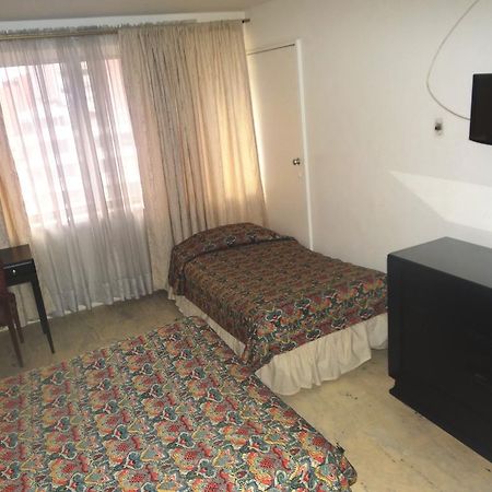 Hotel Nutibara Express Medellín Quarto foto
